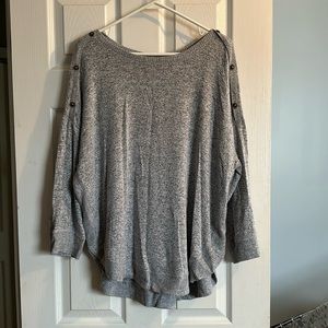 Maurice’s gray sweater